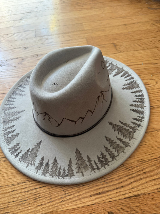 Off white Fedora with mounatains