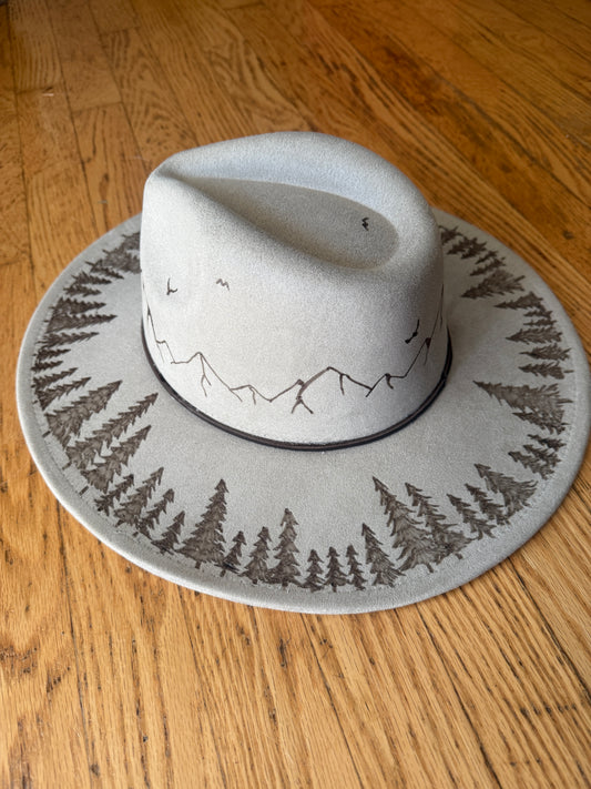 Off white Fedora with mounatains